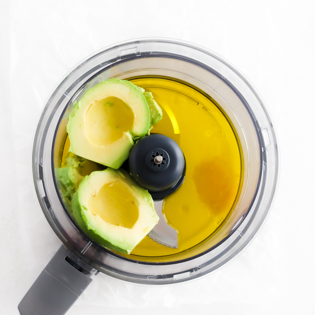Ingredients in a food processor to make a condiment.