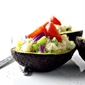 Crab-Stuffed Avocados with onions, tomatoes, and delicious spices! | spiritedandthensome.com